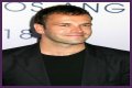 Jonny Lee Miller flashes ink for Ellen charity